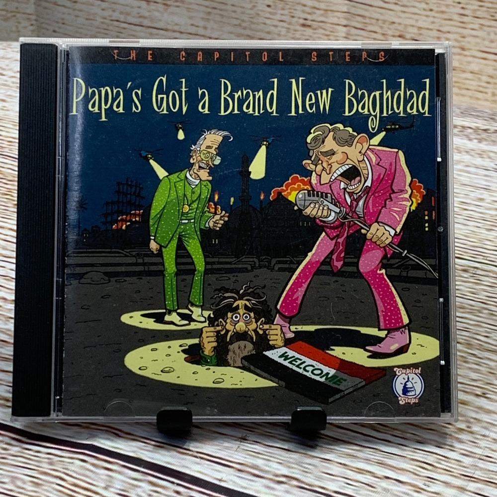 The Capitol Steps - Papa's Got a Brand New Baghdad [CD 2004] Political Comedy‎